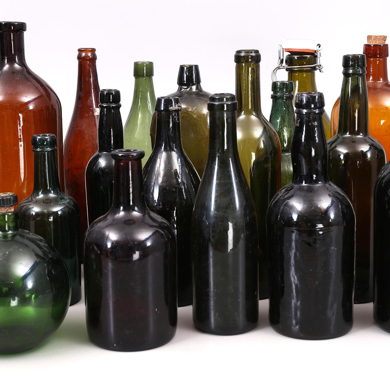 BOTTLES, 20 pcs., glass, 19th/20th century.