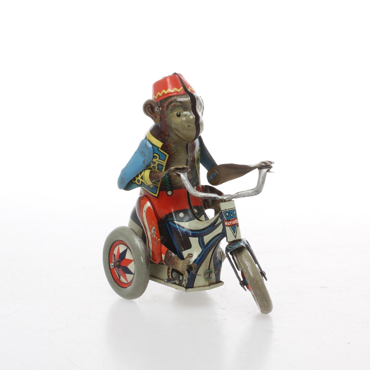 PLÅTLEKSAK, apa på motorcykel, Tyskland.