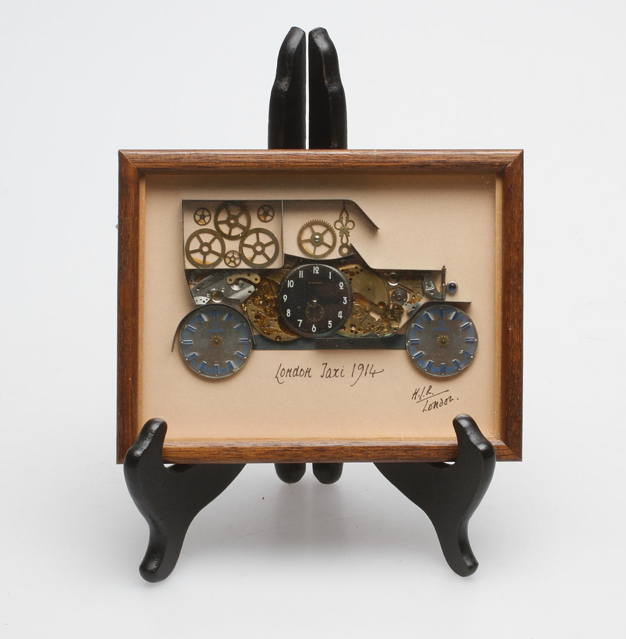 TAVLA, gjord av klockdelar, 1900-tal.