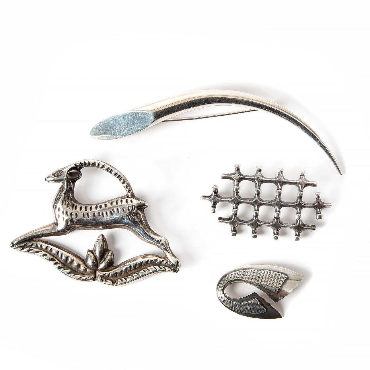 BROCHURES. 4 pieces, silver, including Erik Svane, Helsingborg, 1958.