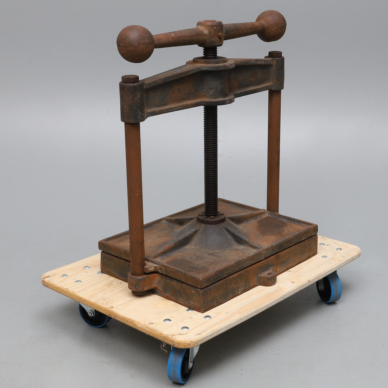 A VICTORIAN CAST IRON BOOK-PRESS.