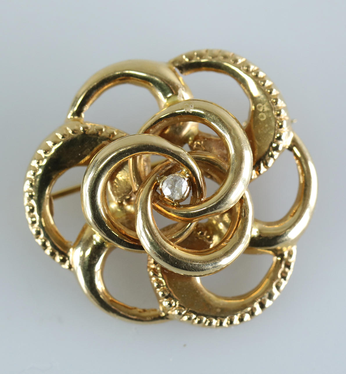 BROSCH, guld 18K, GAB, Stockholm.