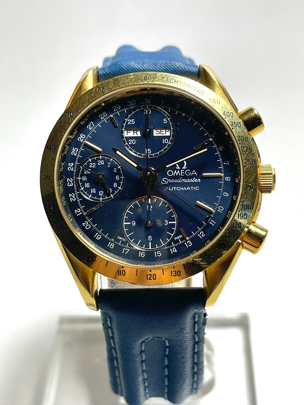 Omega Speedmaster trippel datum 18k klocka.