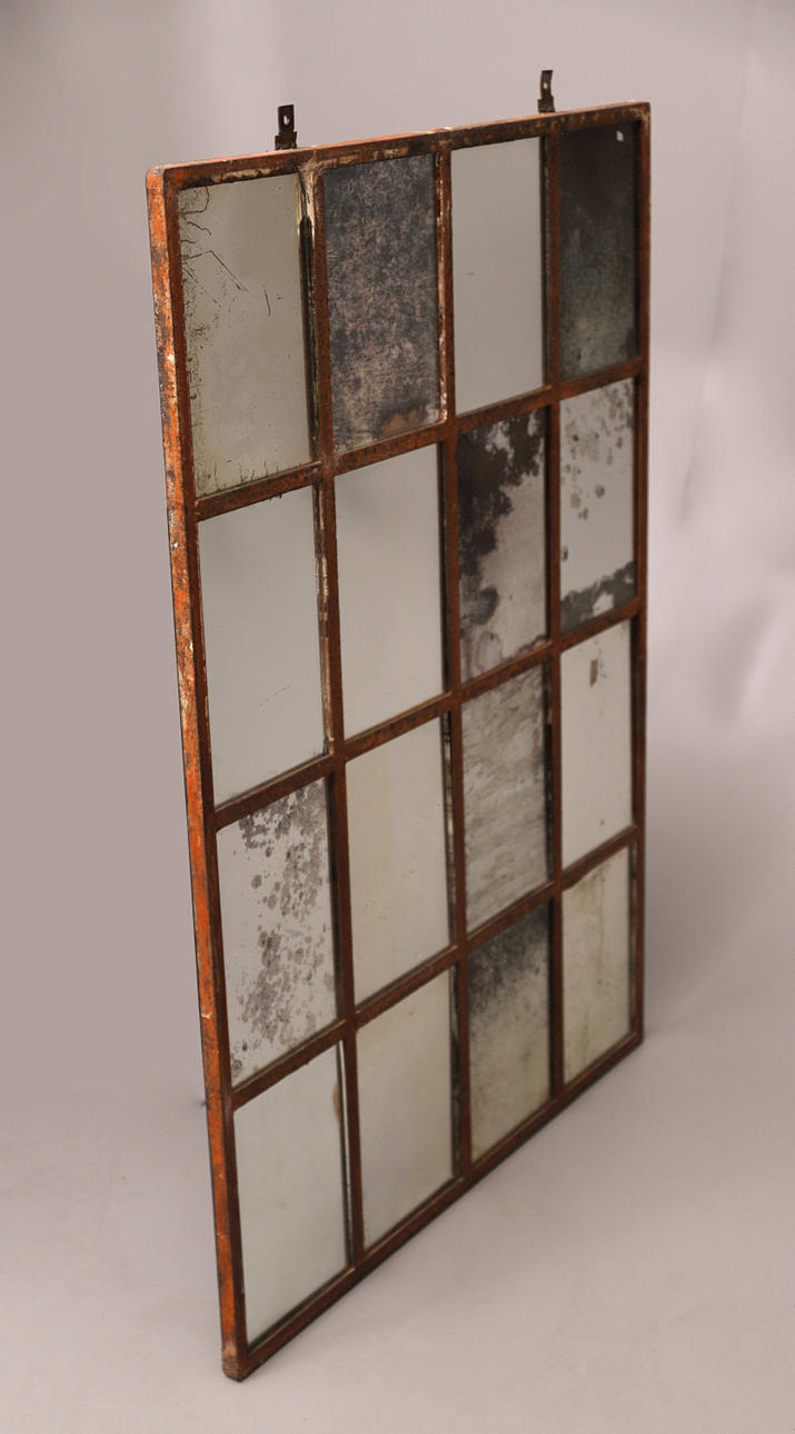 INDUSTRIAL STYLE MIRROR WITH IRON PANELS.