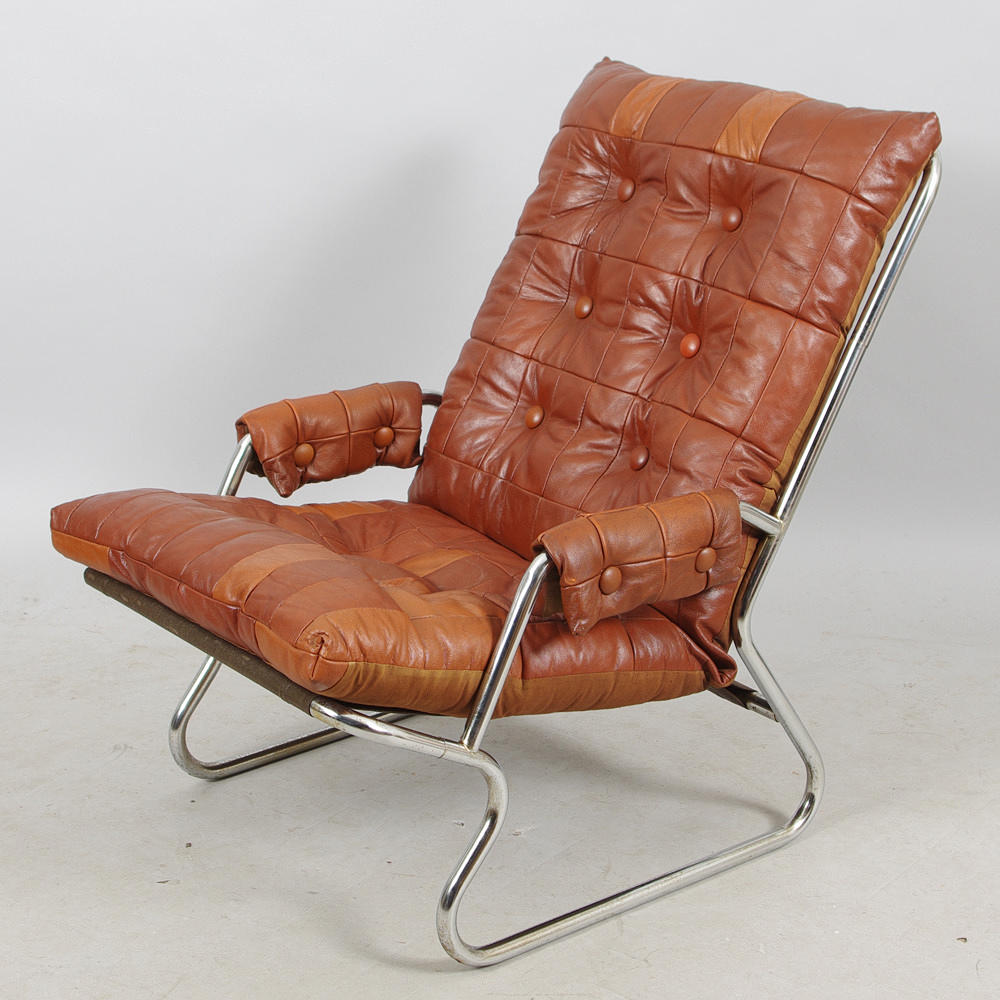 FÅTÖLJ, brunt skinn med kromunderreede.