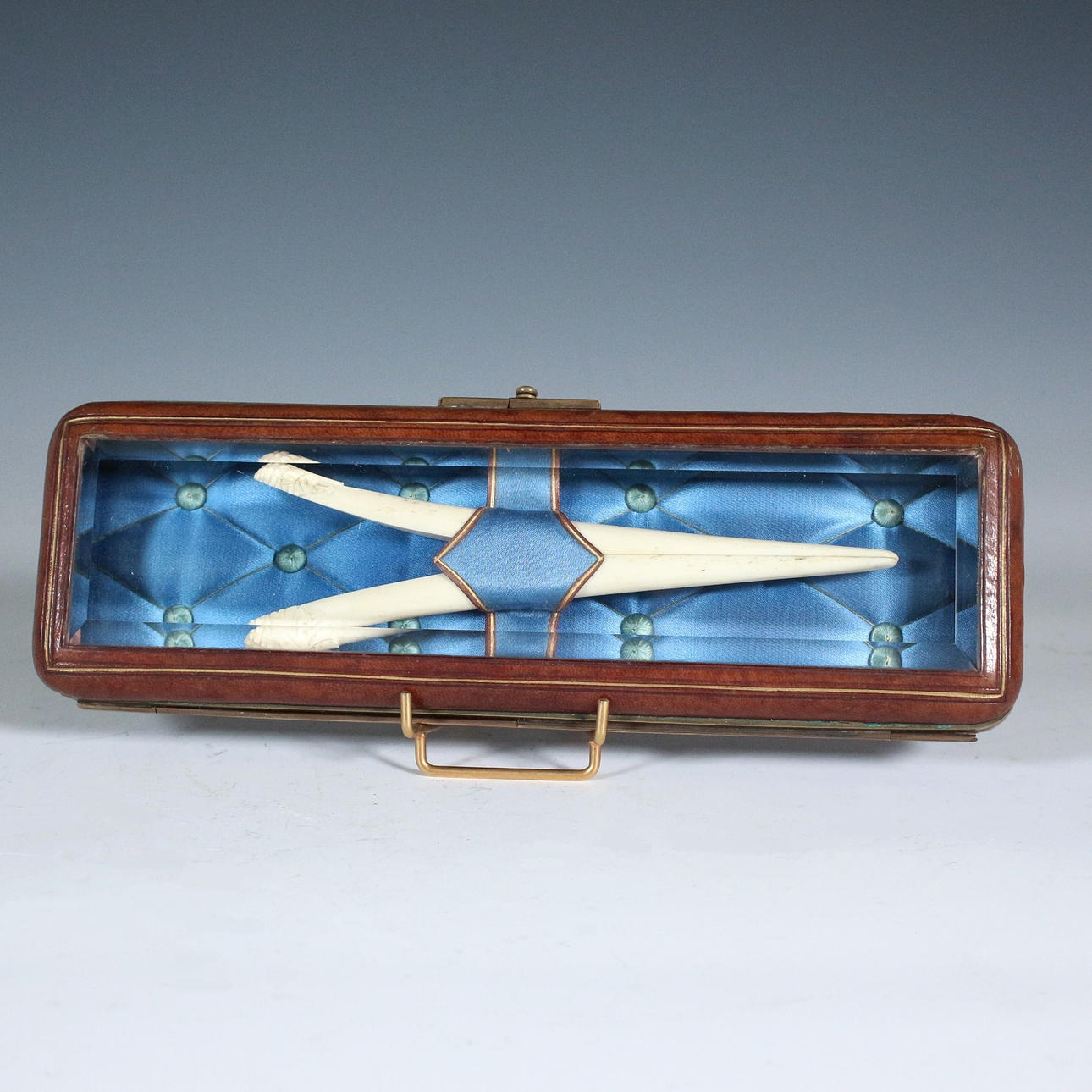 Antique glove stretcher, leg, with box.