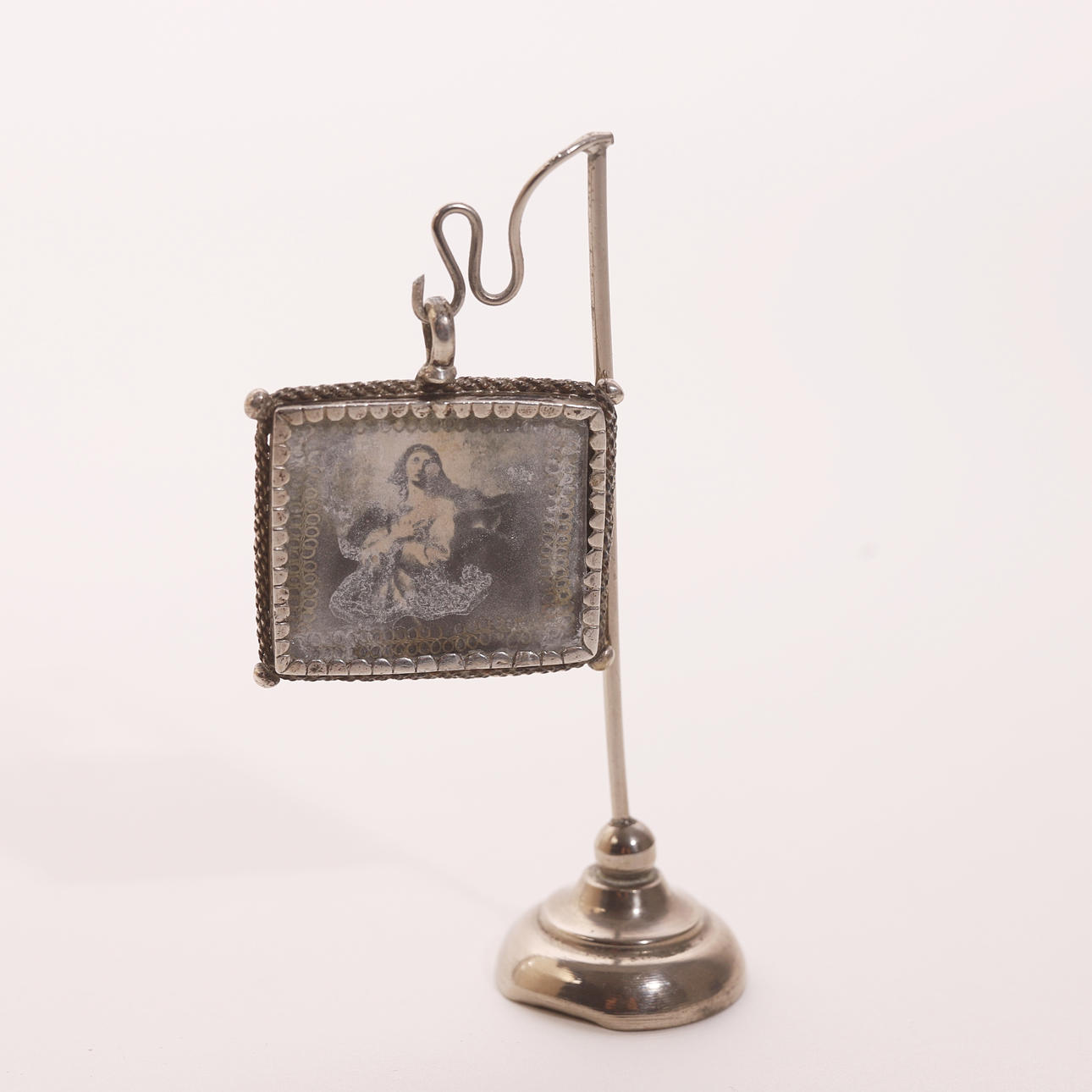 RELICIARY.RELIGIOUS IMAGE, in silver metal.