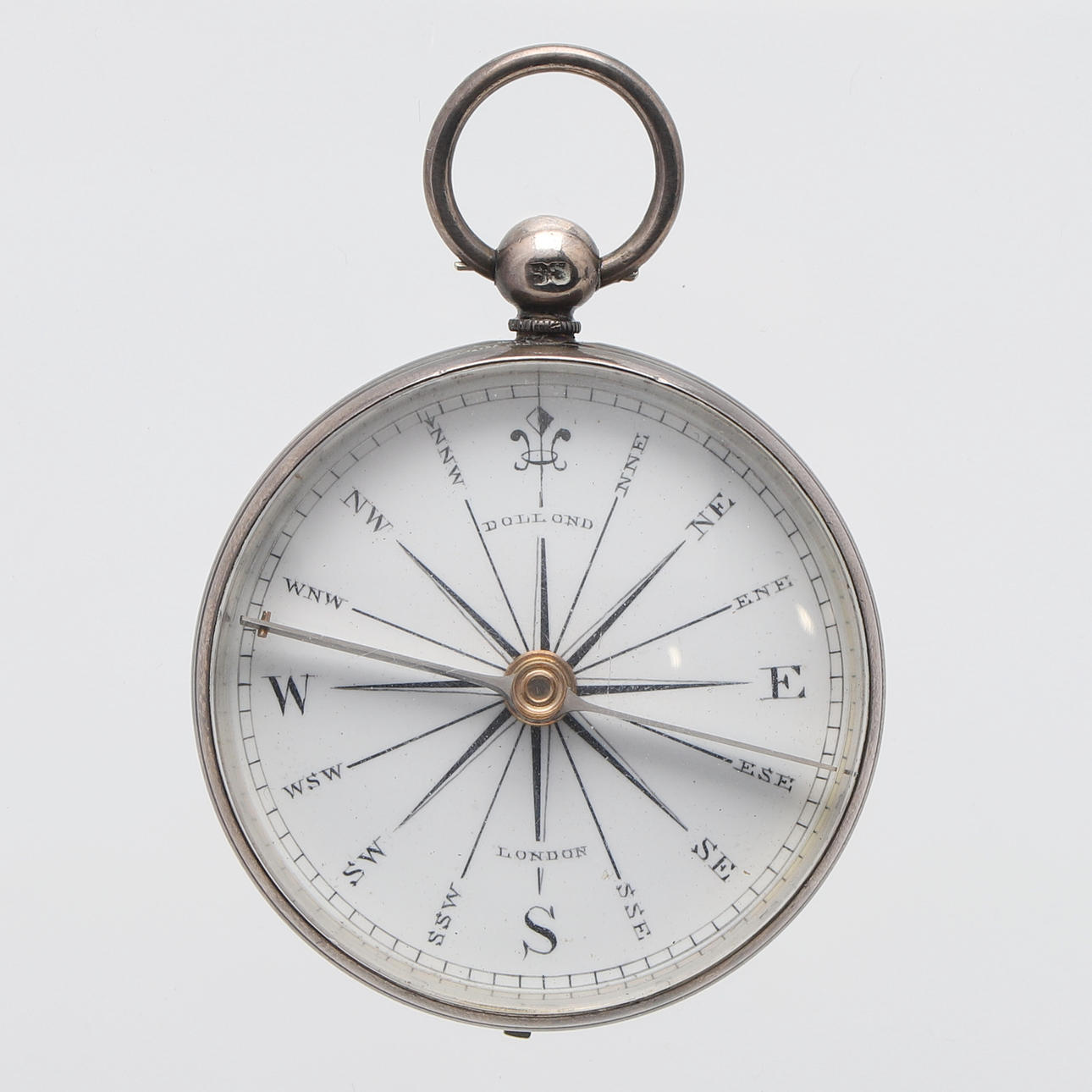 A SILVER CASED POCKET COMPASS.