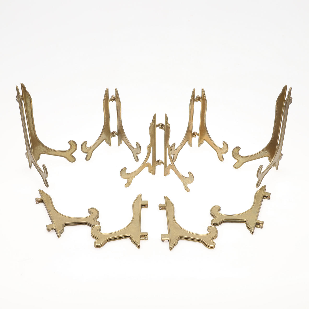 MÄNGD VINTAGE MÄSSING FÄLLBARA PLATTA STÅR.