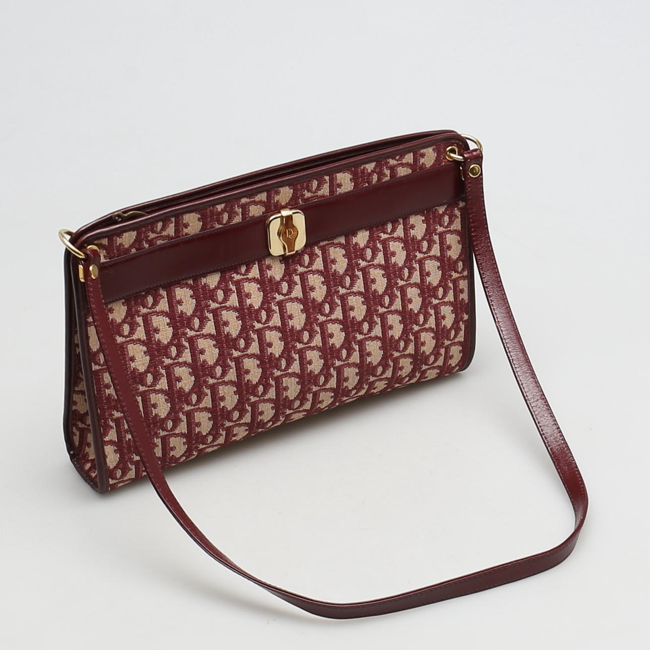 VÄSKA i tyg och skinn. Axelremsväska, Christian Dior, Frankrike.