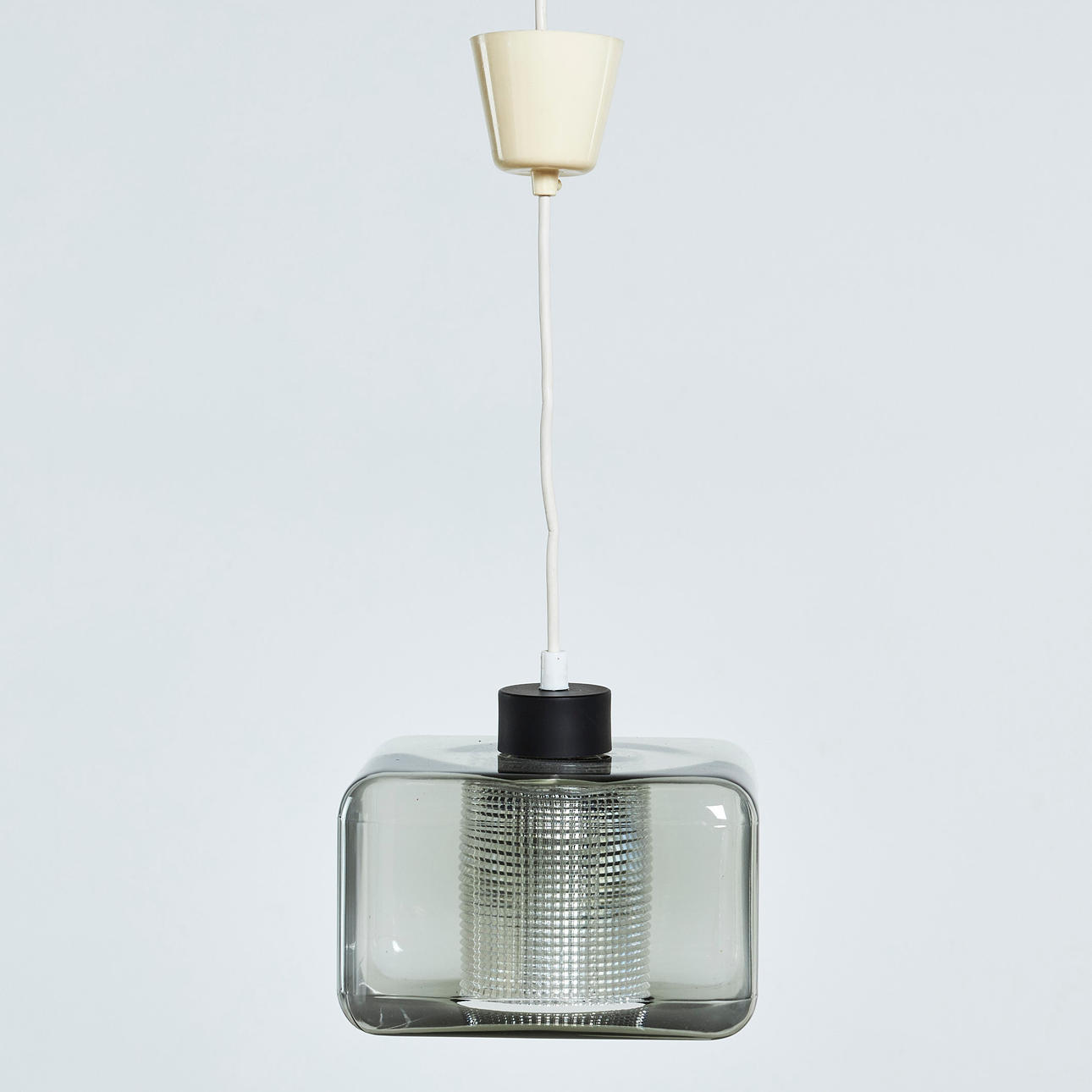 CARL FAGERLUND. Ceiling lamp, double domes, the innermost one in grid-patterned pressed glass, the upper one in smoked glass, Orrefors, mid-20th century.