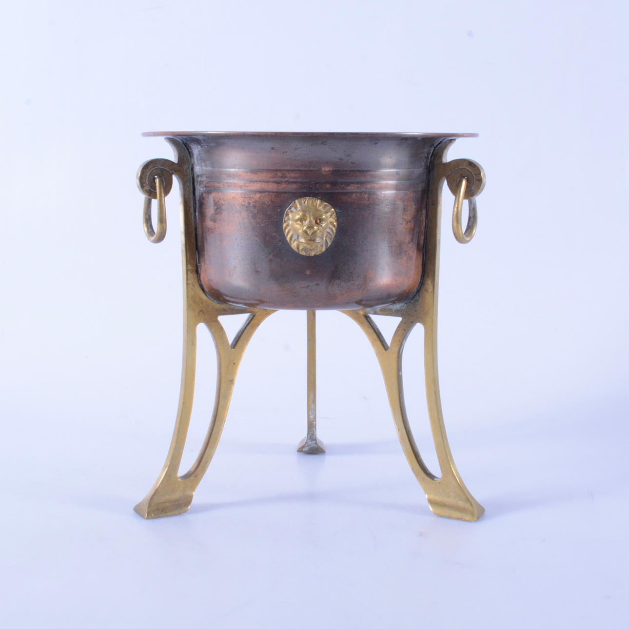 TRIPOD WITH LION MASCARONES, copper/brass, 19th century.