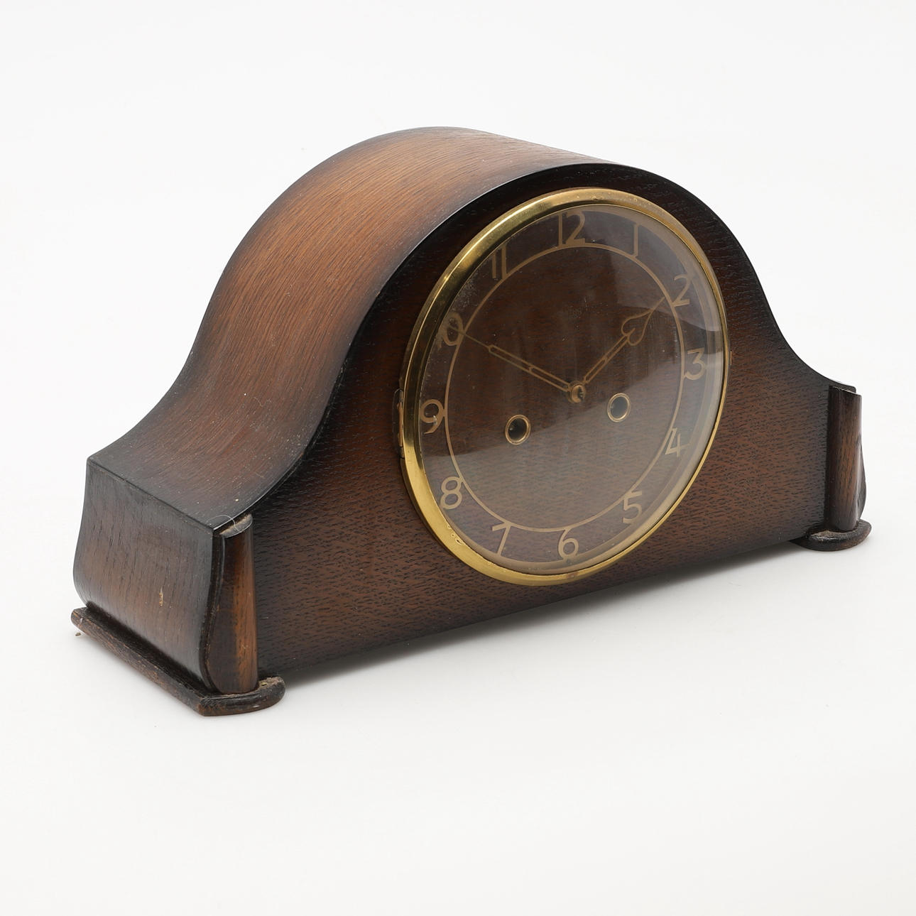 A VINTAGE ENFIELD OAK MANTEL CLOCK.