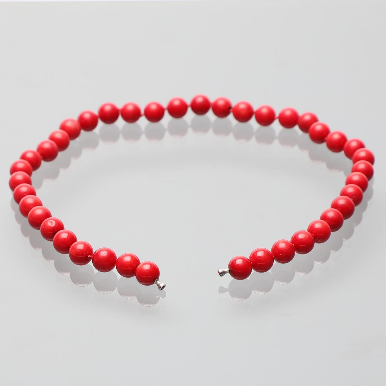 OLE LYNGGAARD. collier, red stones, Denmark.