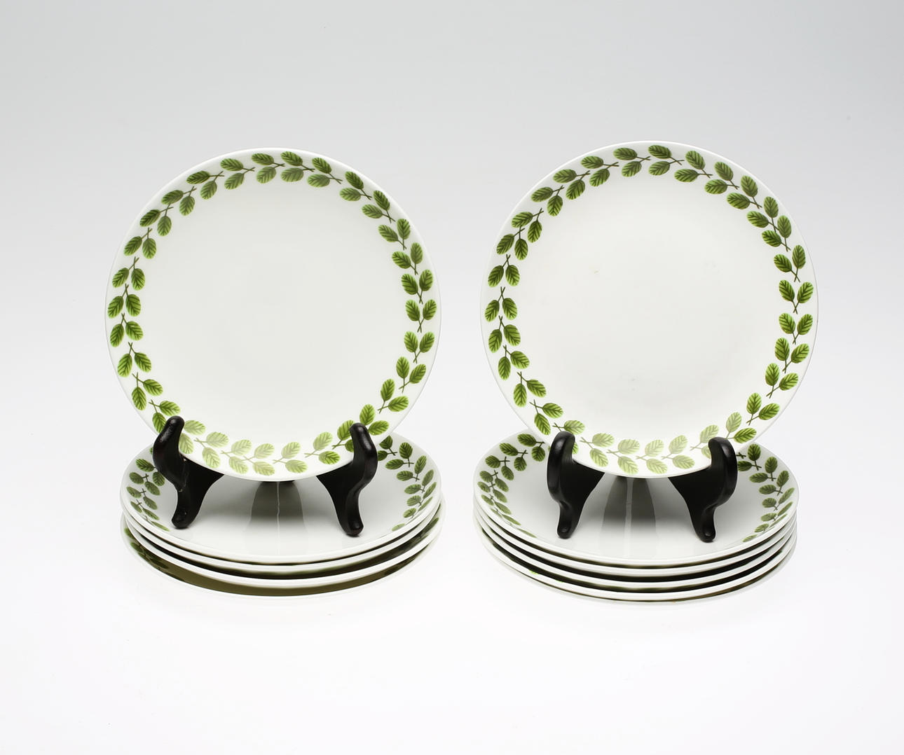 STIG LINDBERG. Assietter, 11 st, Festong.