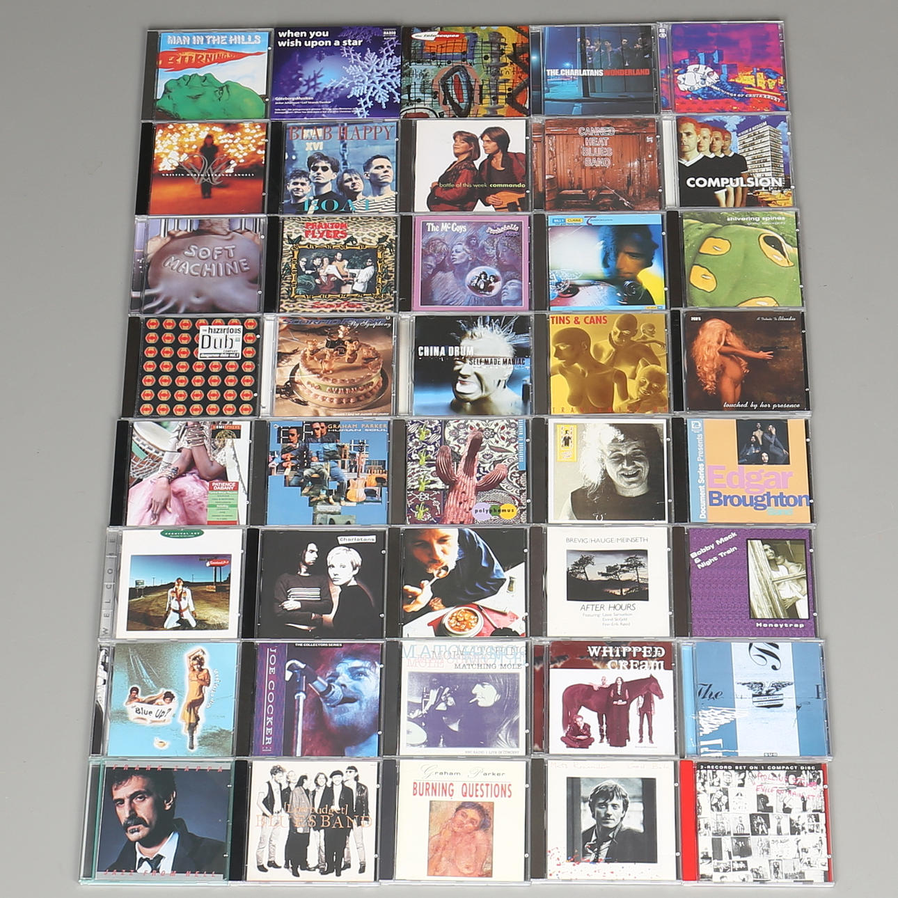 PARTI CD-SKIVOR. 40 st. Bl a The Rolling Stones, Burning Spear and The Charlatans.