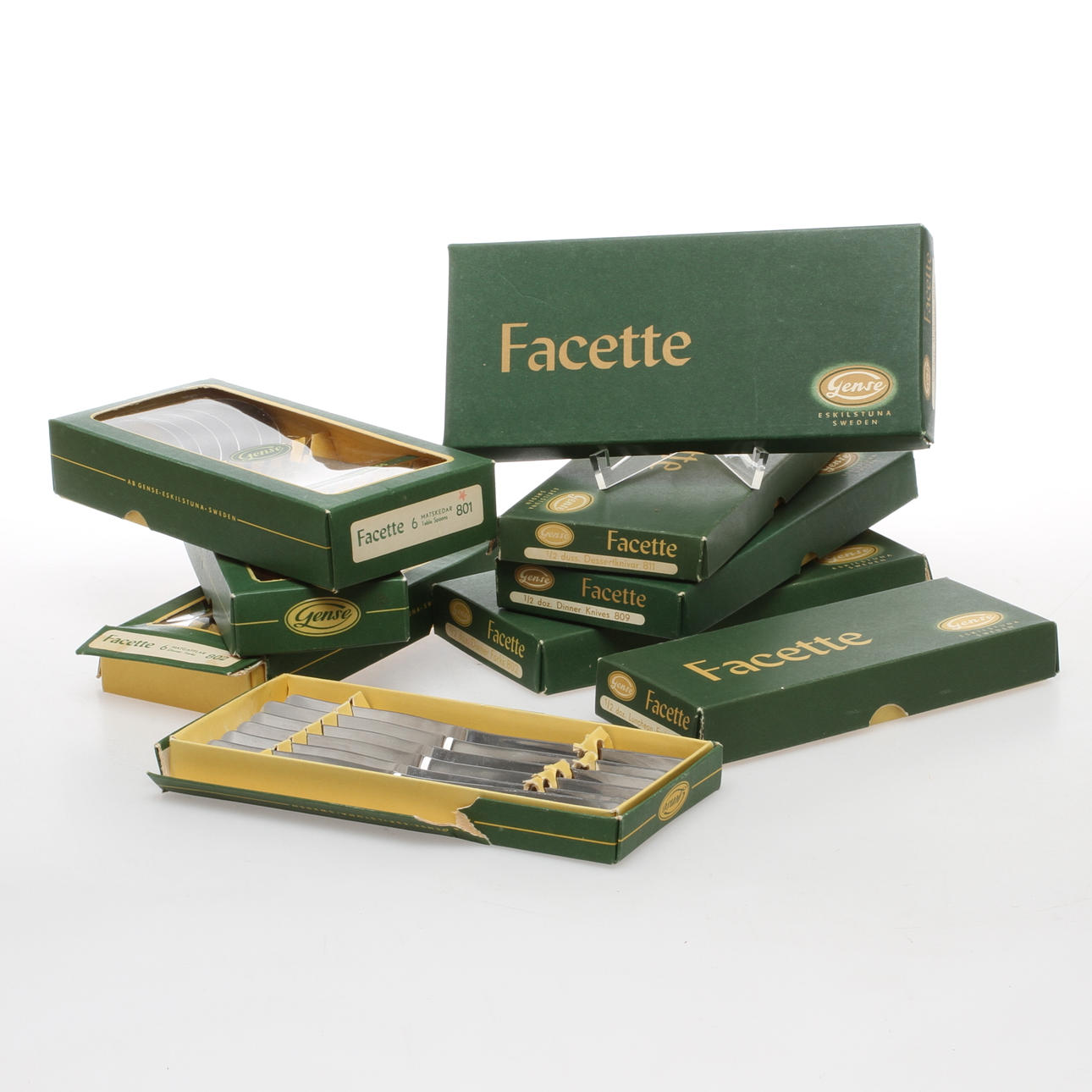 BESTICK i originalkartonger, rostfritt stål, "Facette", Gense.