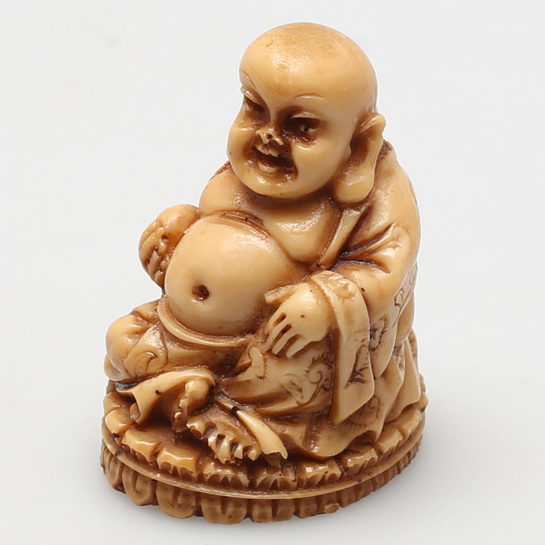 FIGURIN i benmassa. Buddha. Kina. 1900-talet.