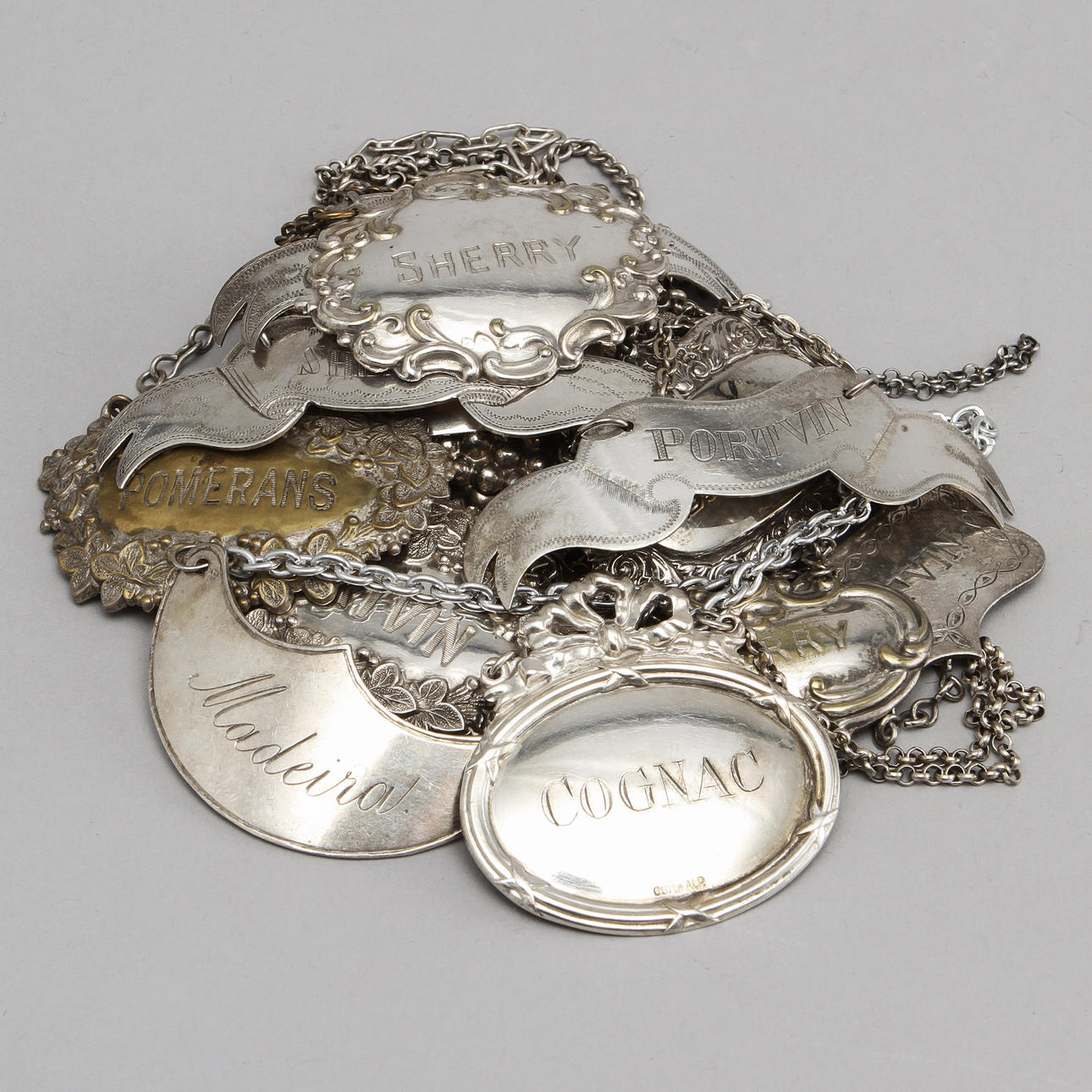 KARAFFSKYLTAR, 17 st, nysilver, 1900-tal.