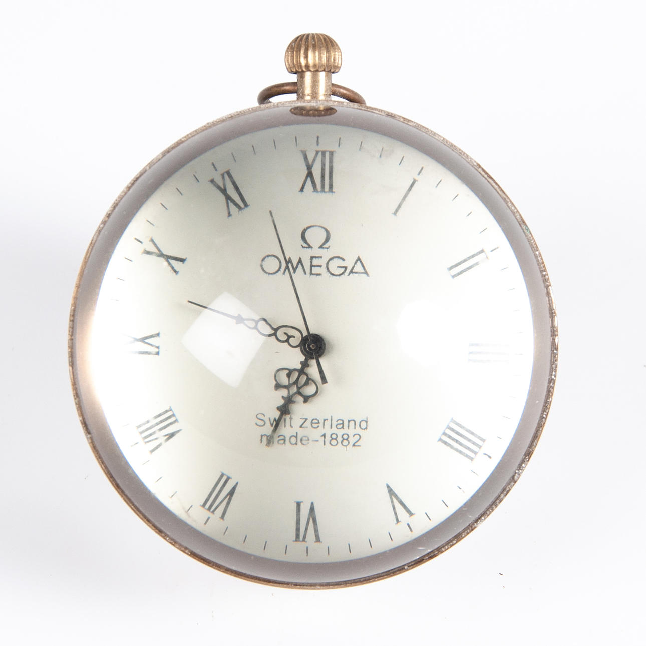 OMEGA. Table clock, brass and glass.