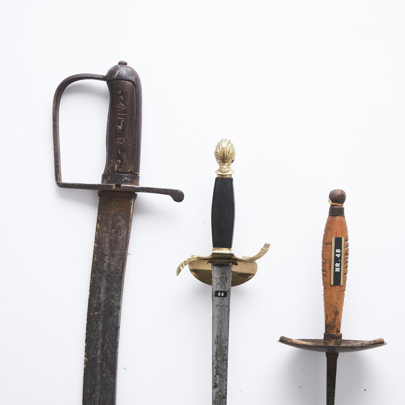 SABER, VÄRJA and FLORETT, second half of the 19th century and around 1900, saber with steel scabbard, sword with brass mount, sword with stucco blade with engraved decoration.
