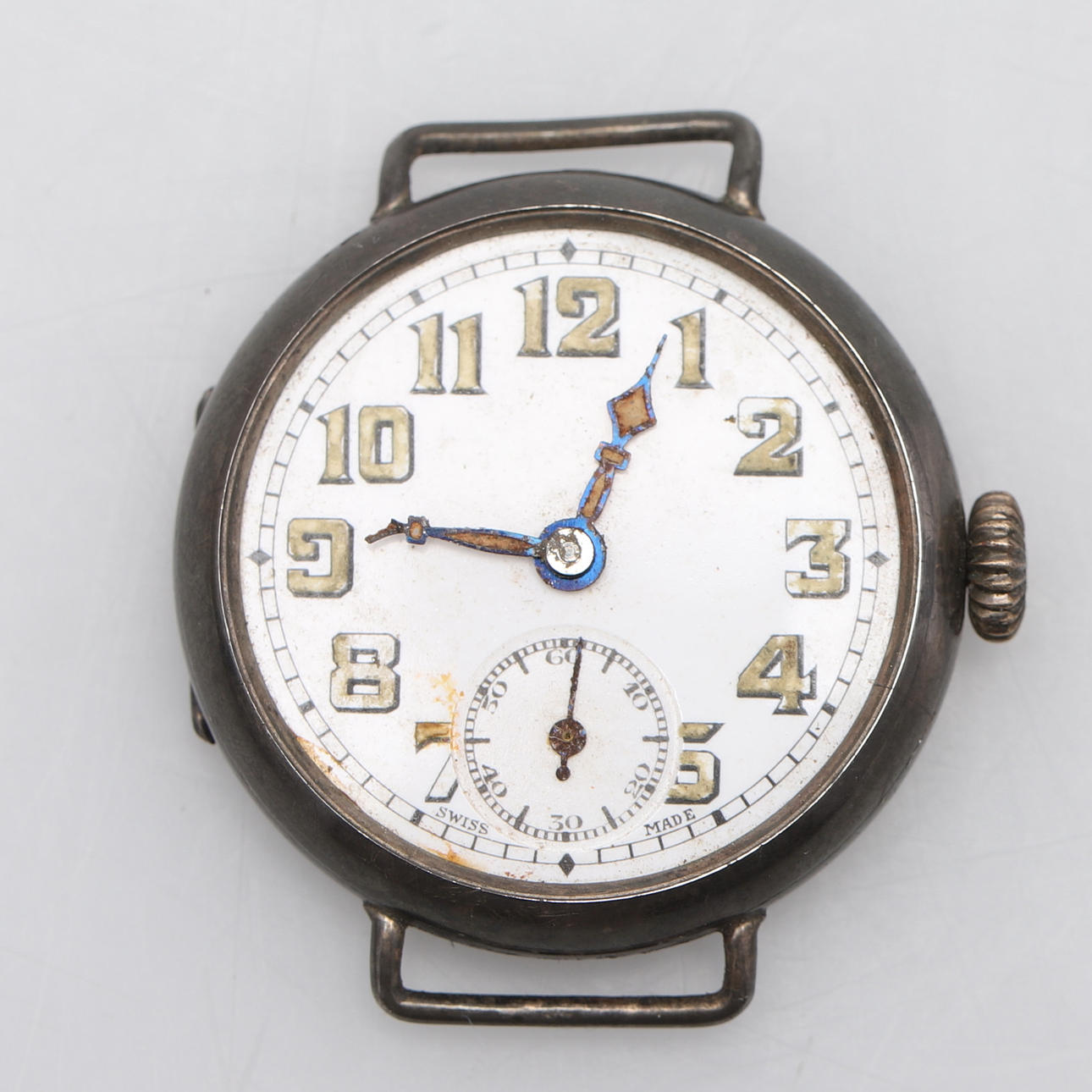 A VINTAGE SILVER CASED WRIST WATCH.