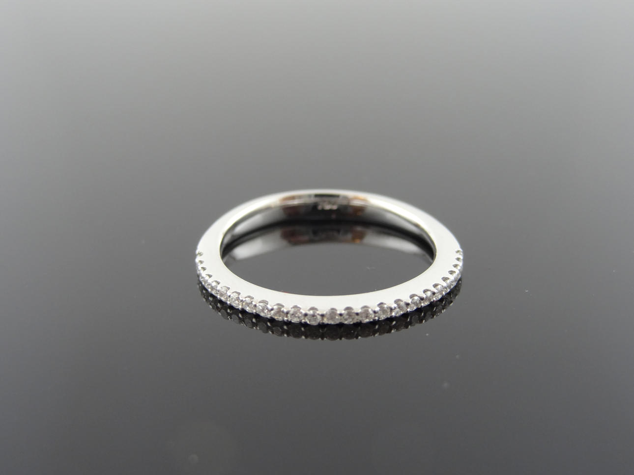 Kvinnors diamantring 0,16cts 18 k guld.