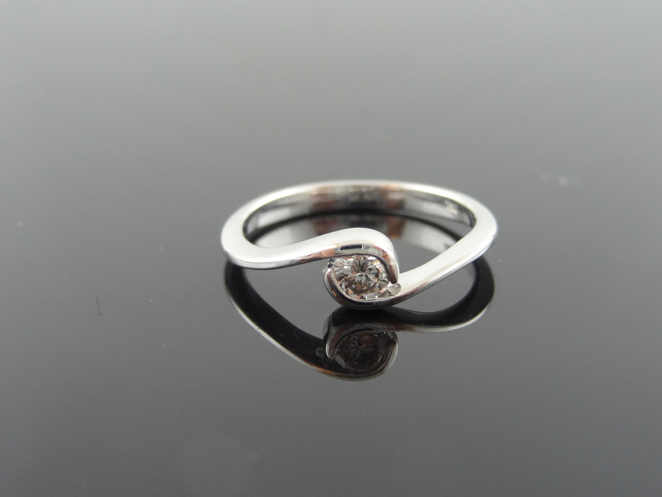 Kvinnors Solitare diamantring 0,22ct 18 k guld.