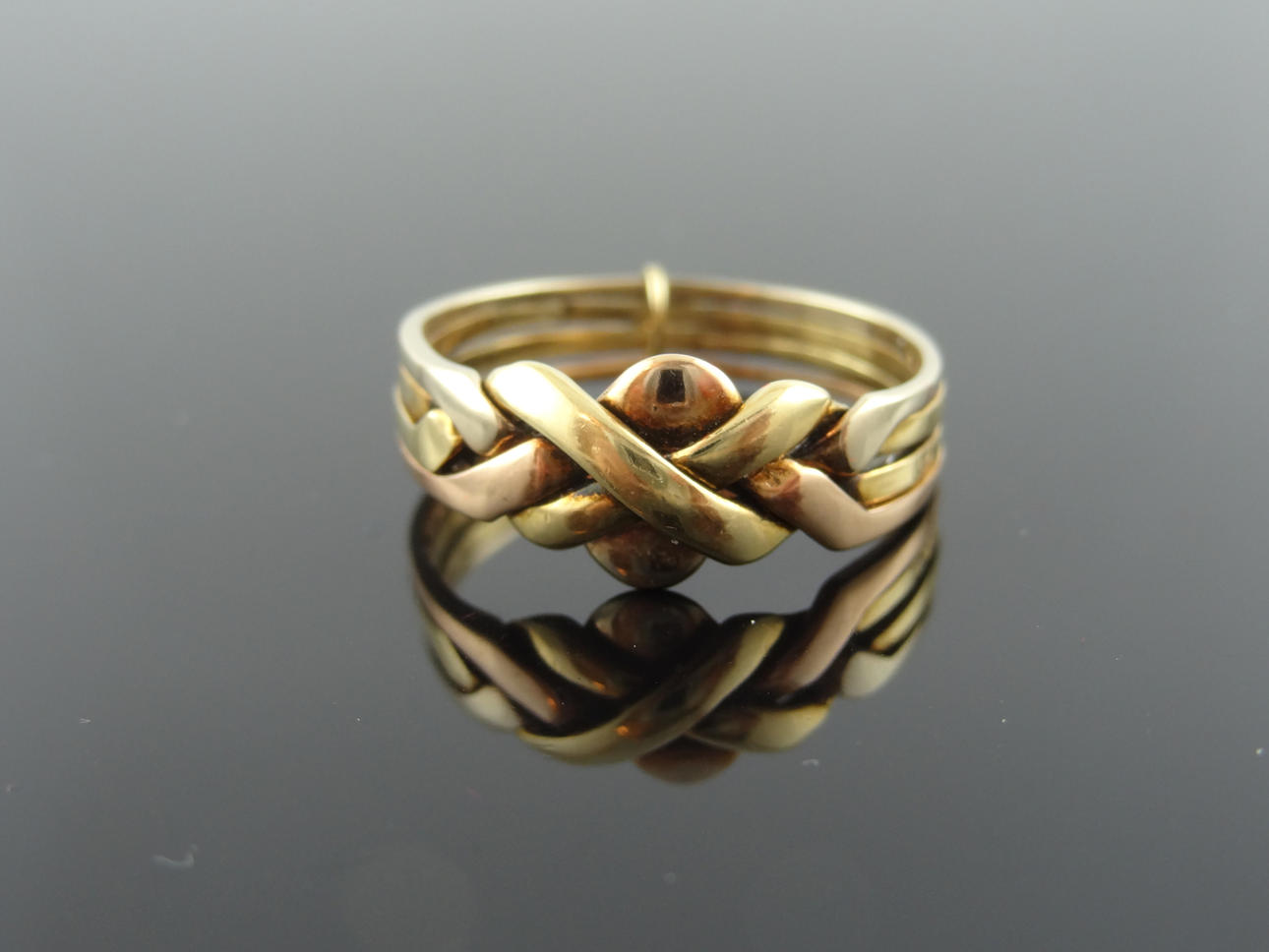 MÄNS 18k guld djävulens näve ring 4 del.