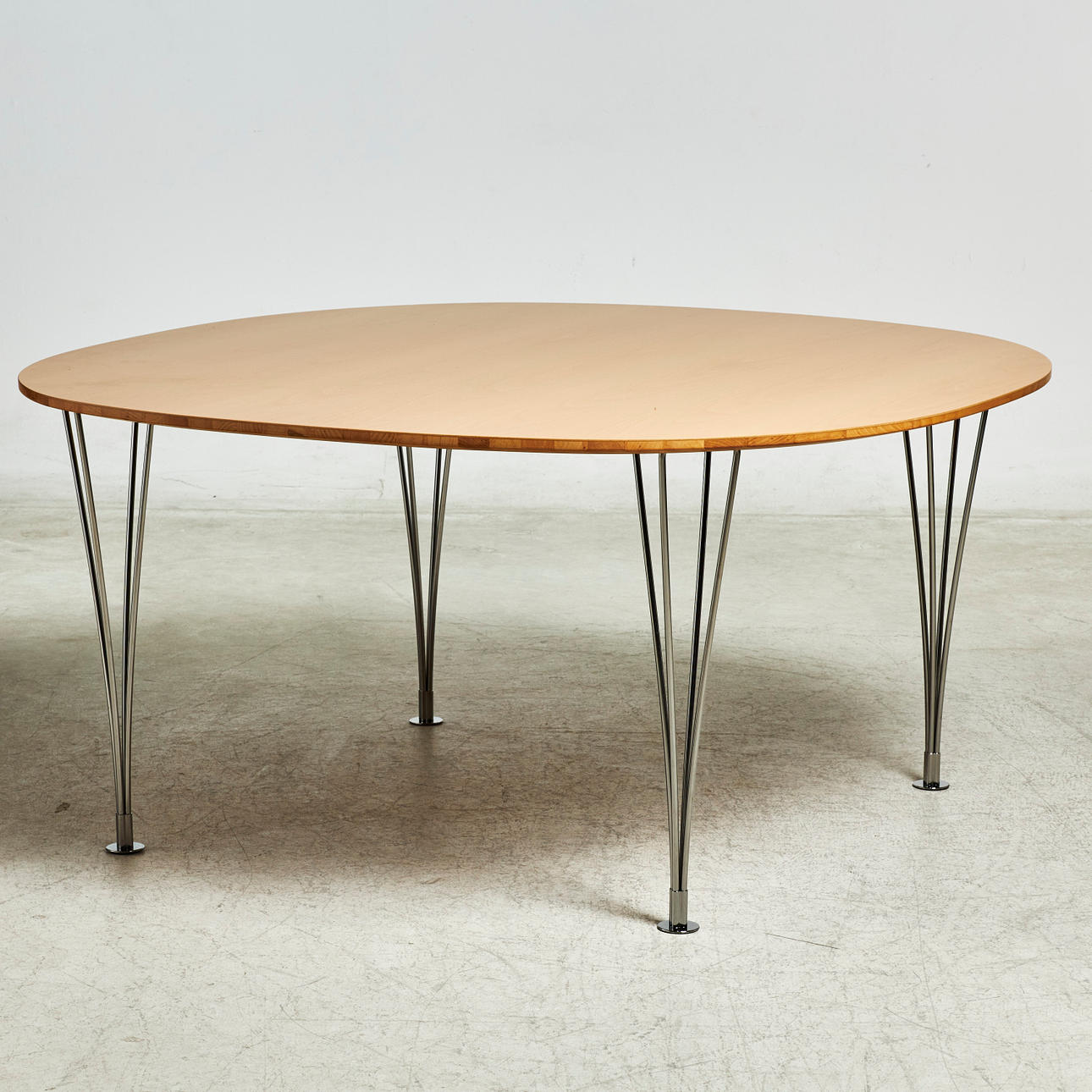 BRUNO MATHSSON & PIET HEIN. DINING TABLE, Supercirkel Mi 315, Bruno Mathsson International, Värnamo, book, label marked underneath.