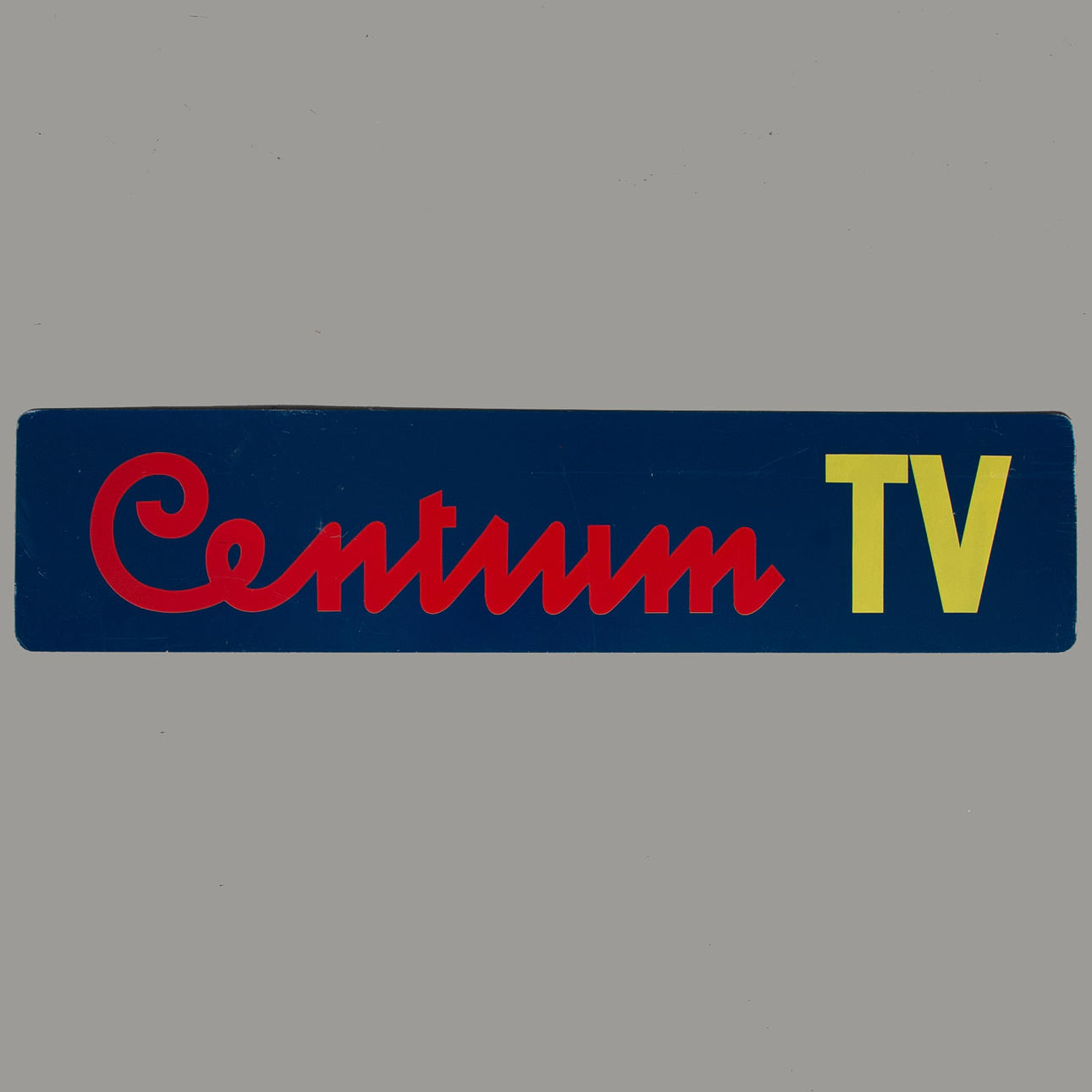 REKLAMDISPLAY. CENTRUM TV. Skylt, plåt.