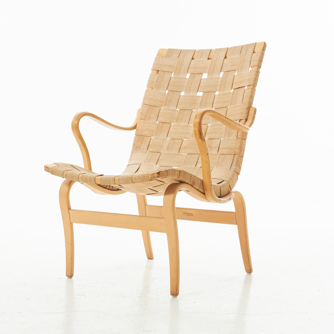 BRUNO MATHSSON. Fåtölj, "Eva", klädsel med sadelgjord.