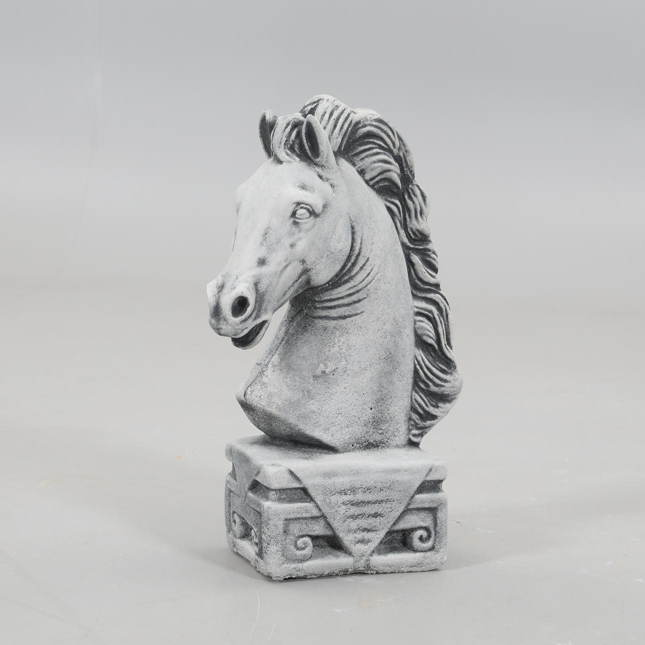 HORSE HEAD IN CONCRETE.