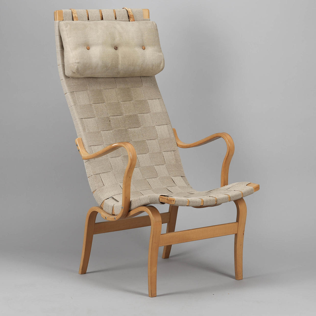 BRUNO MATHSSON. Armchair, "Eva" with high back, beech, saddle girth, Dux.