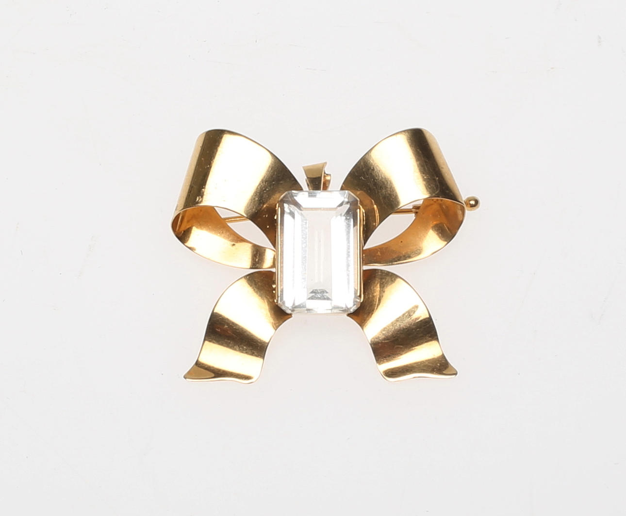 BROSCH 18 karat, med slipad sten, "Stigbert".