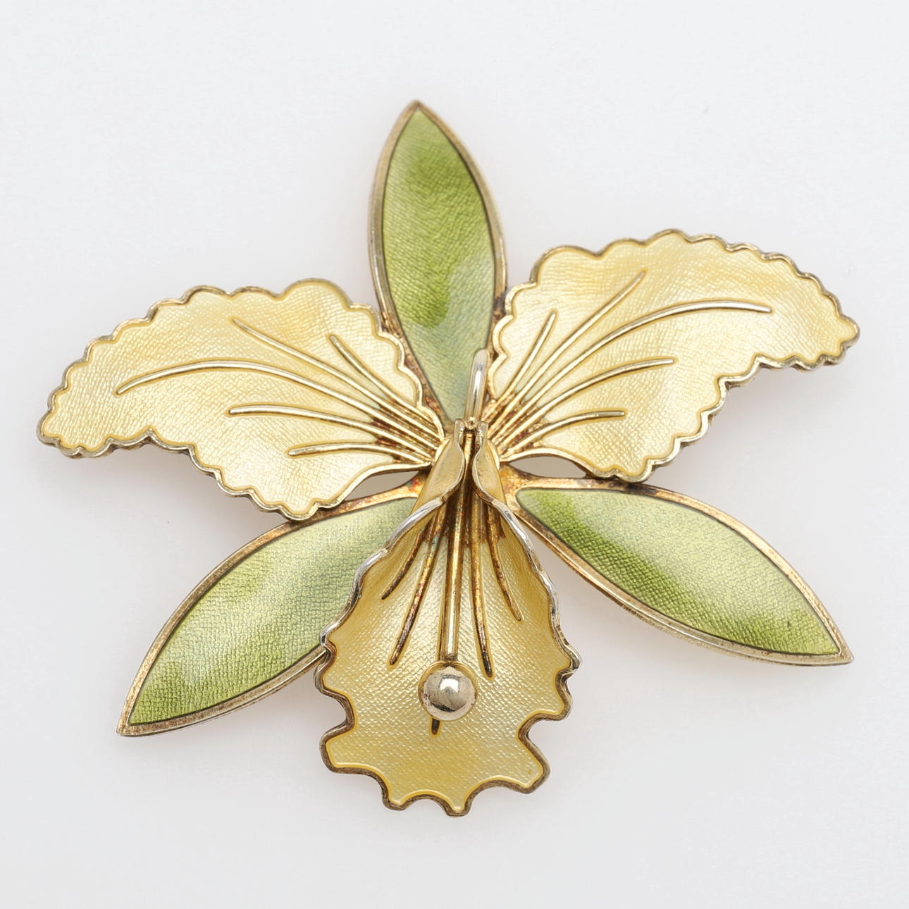 AXEL HOLMSEN, BROCHE I FORM AF EN ORKIDE.