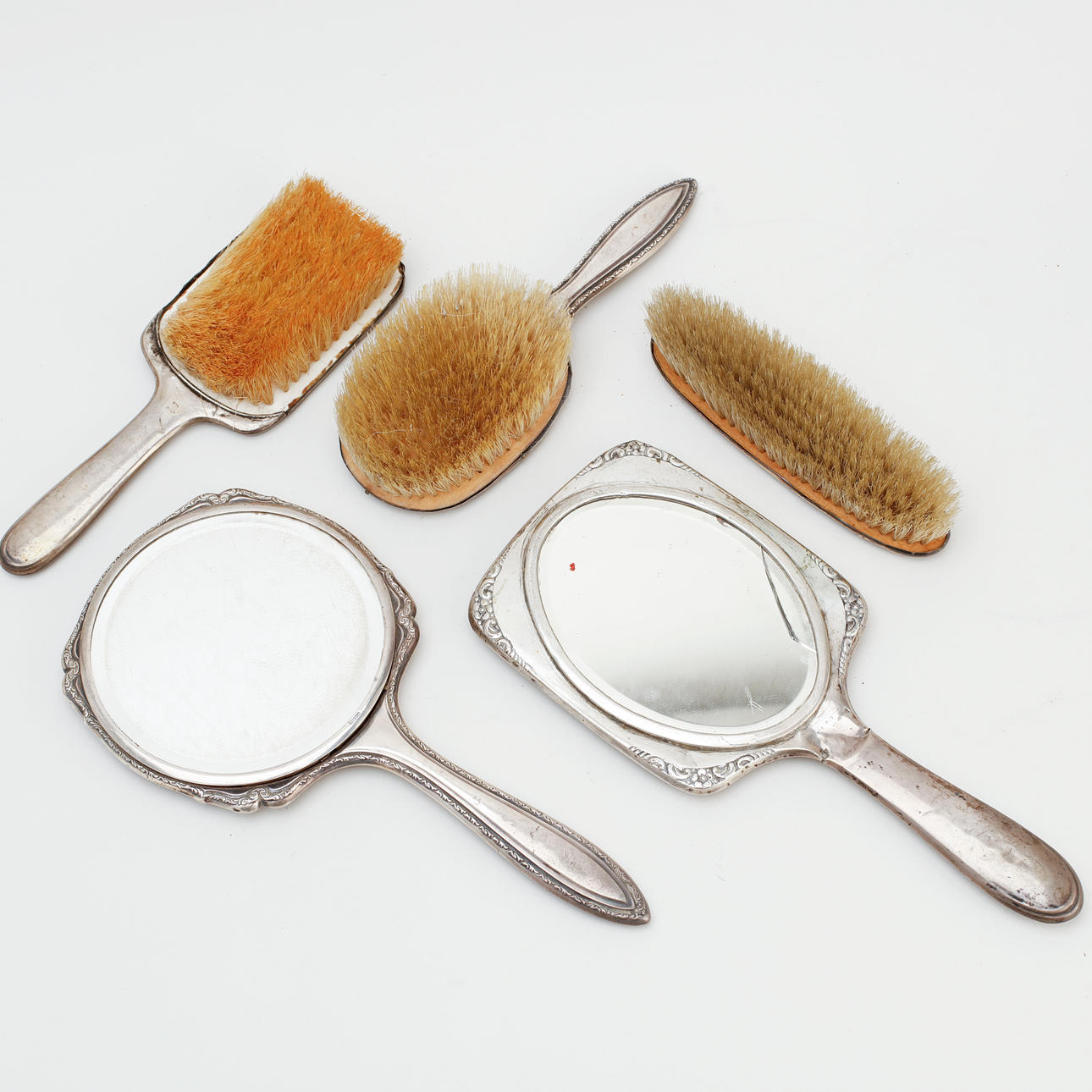HAND MIRRORS, 2 pcs and BRUSHES, 3 pcs, silver.