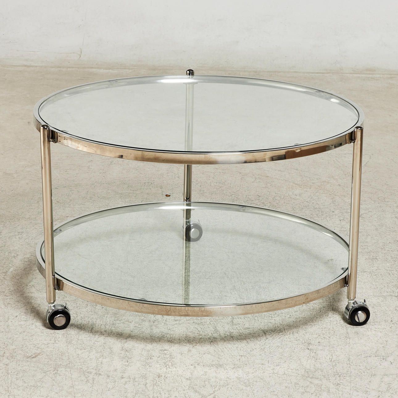 COFFEE TABLE, 1990s, round model, chrome frame, glass panels, on wheels.