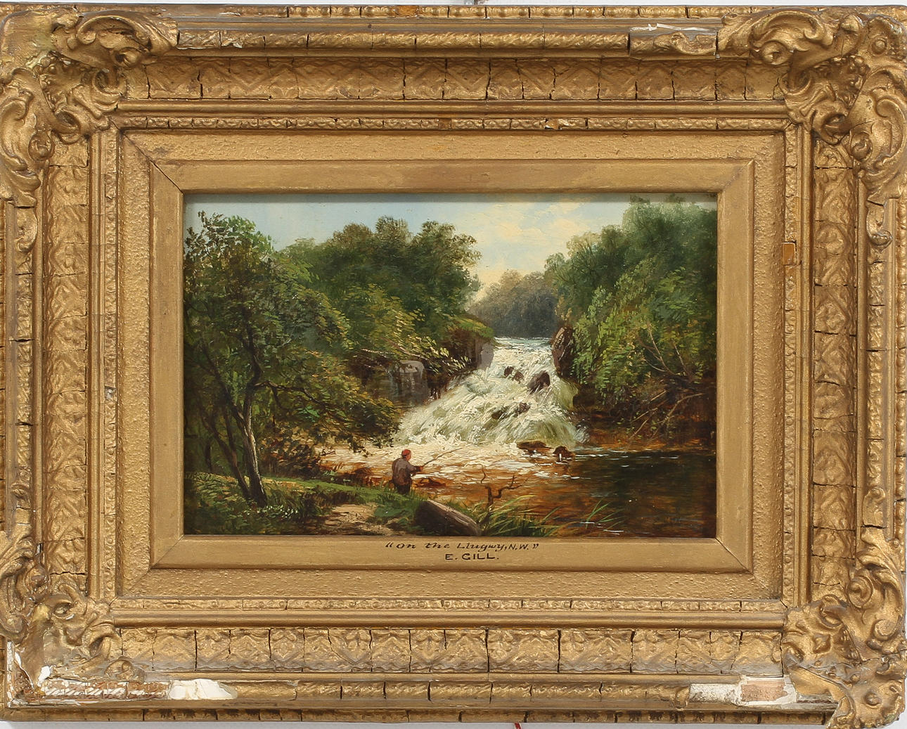 OIDENTIFIERAD KONSTNÄR. "On the Llugwy, N.W." olja på pannå, signerad E. Gill, 1800-tal.