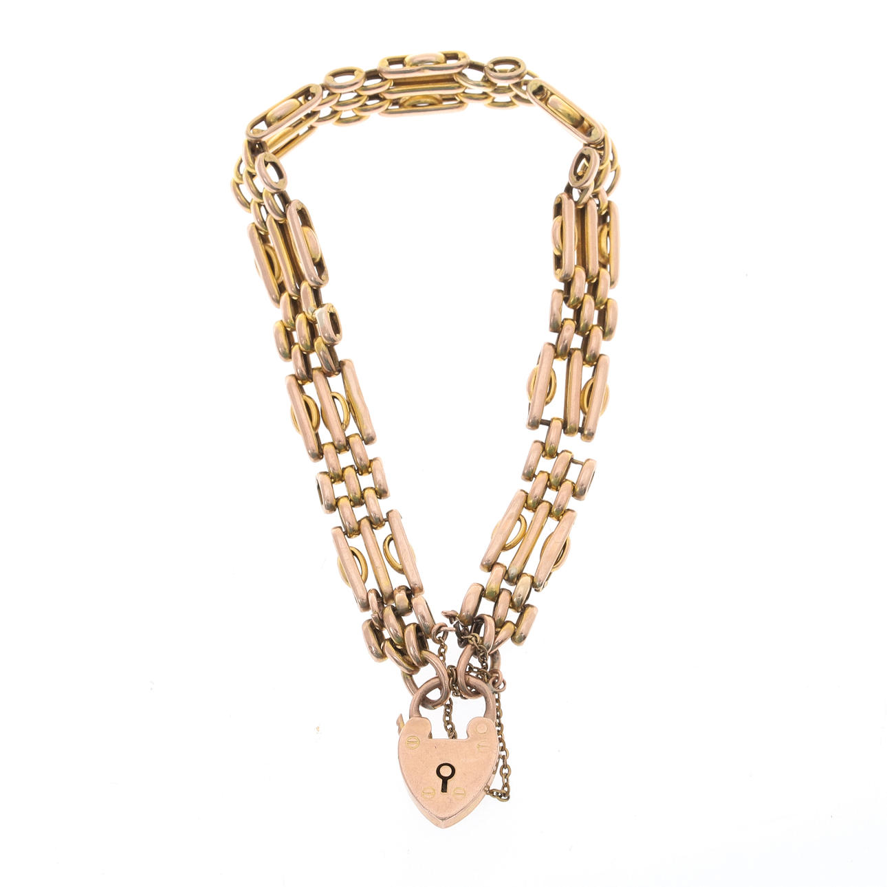 EDWARDIAN 9 KARAT GULD GATELINK ARMBAND.