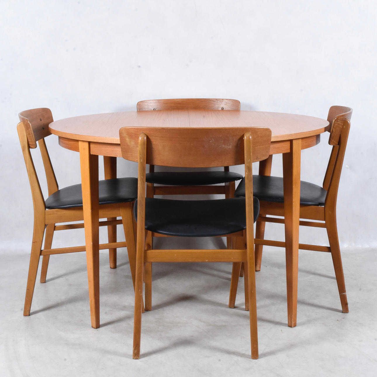 DINING TABLE, 4 chairs, teak and book, 1960s.