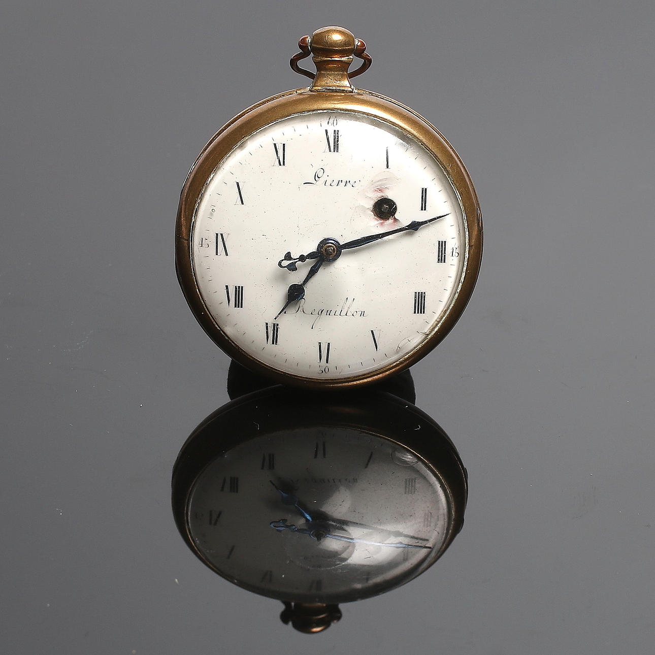 SPINDELUR, gul metall, Pierre Reguillon. Tidigt 1800-tal.