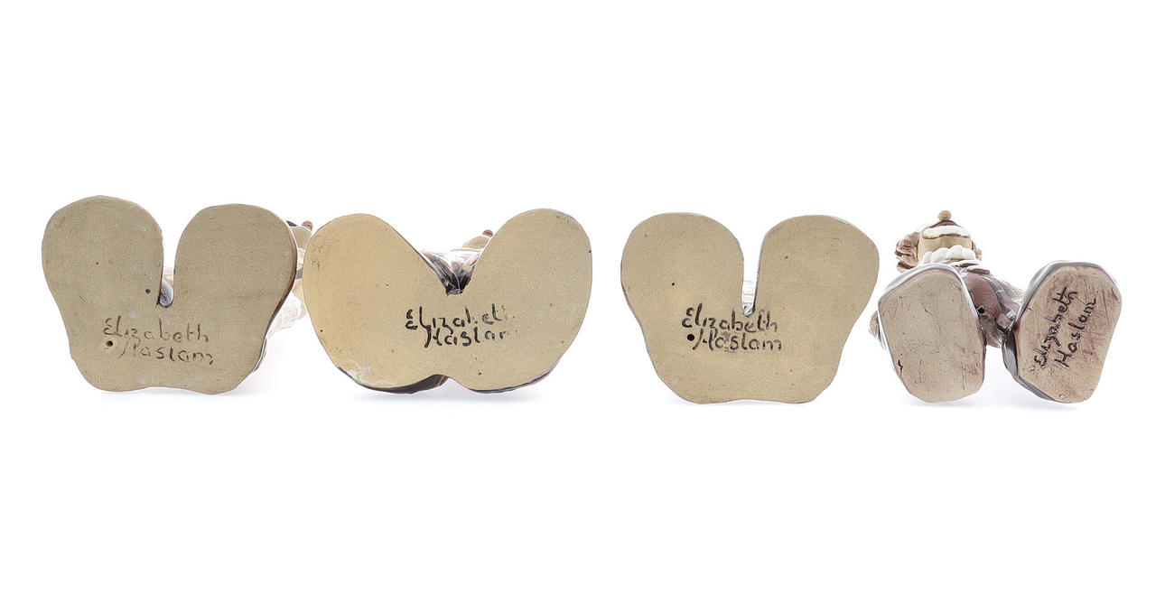 ELIZABETH HASLAM. A COLLECTION OF FOUR STUDIO POTTERY CLOWNS, CIRCA ...