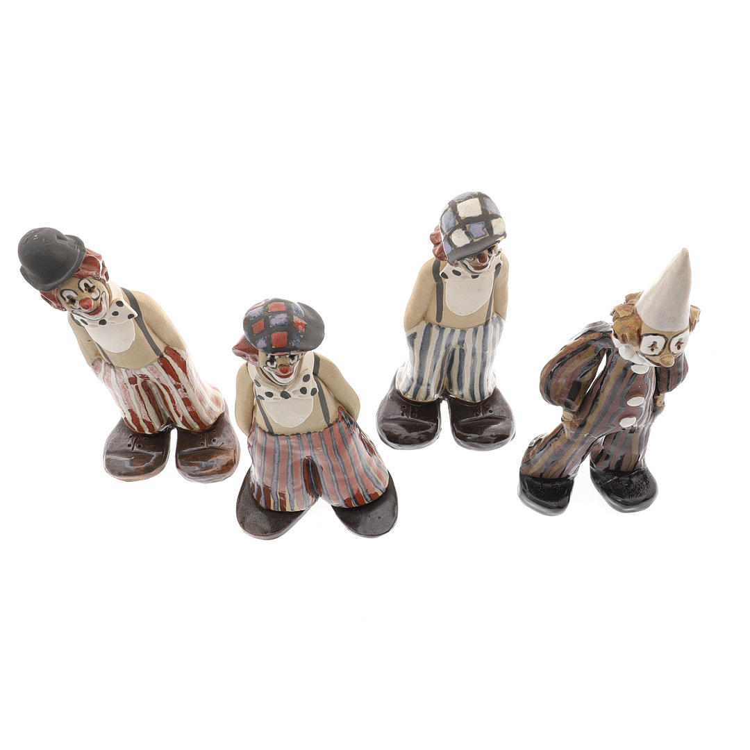 ELIZABETH HASLAM. A COLLECTION OF FOUR STUDIO POTTERY CLOWNS, CIRCA ...