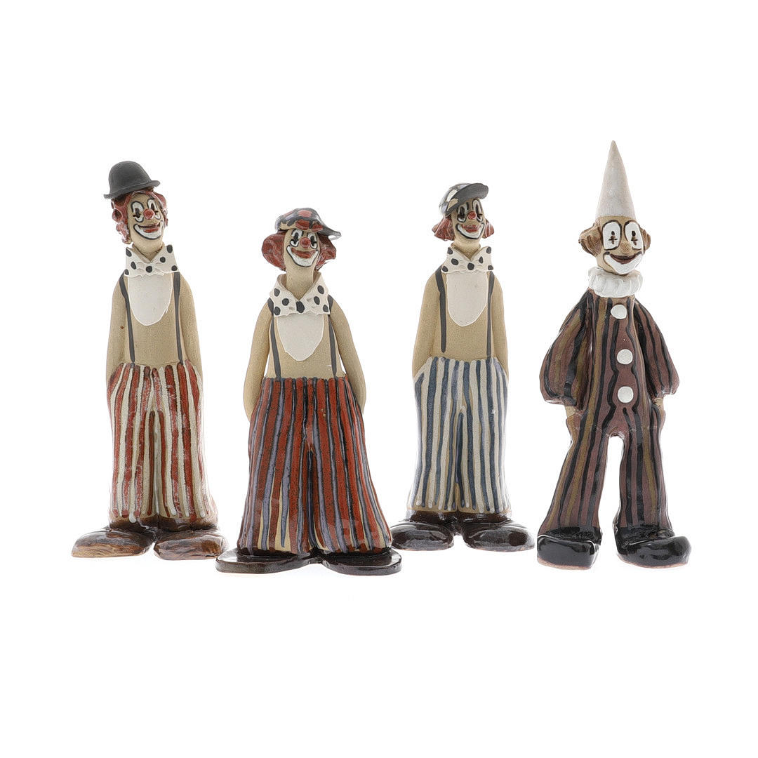 ELIZABETH HASLAM. A COLLECTION OF FOUR STUDIO POTTERY CLOWNS, CIRCA ...