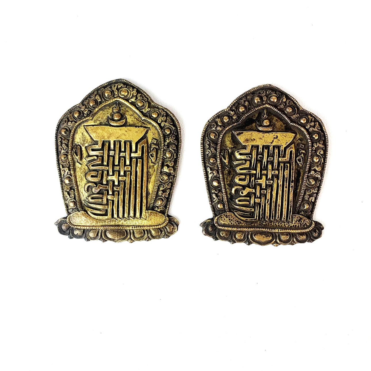 PAAR HEILIGE TIBETISCHE SYMBOLE.