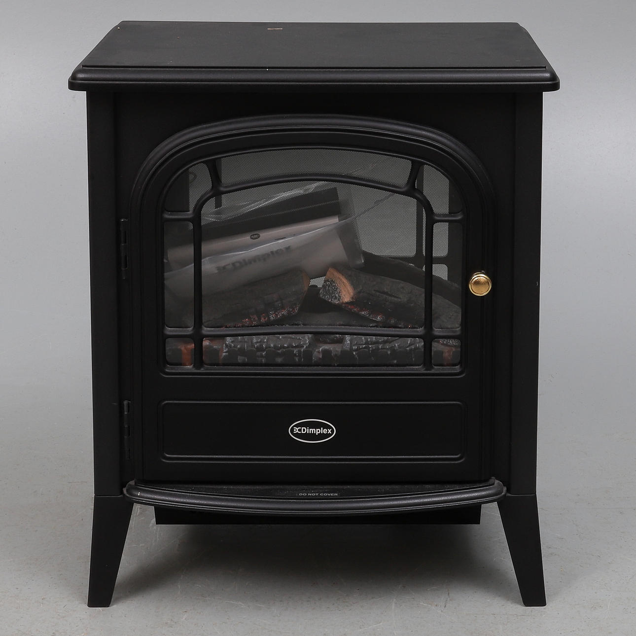 EN DIMPLEX ELEKTRISK ELD MED FJÄRRKONTROLL.