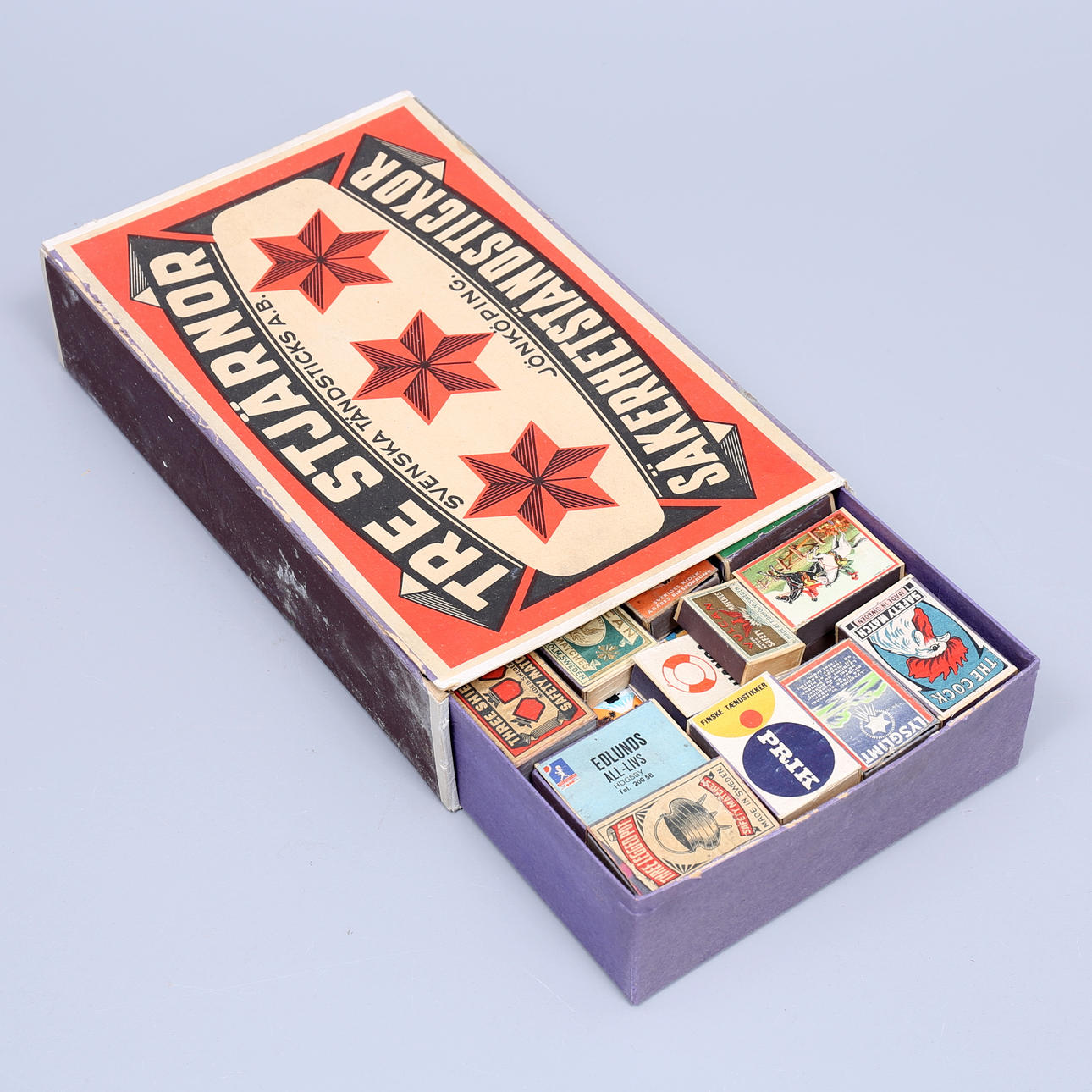 MATCH BOXES, collection lying in a large box, 1900s.