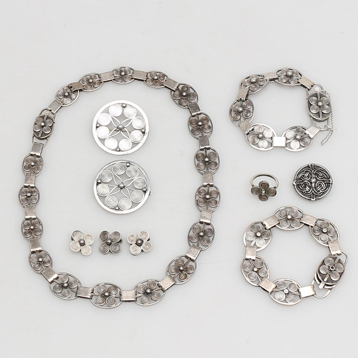 PARTI SILVERSMYCKEN, 10 delar, spiralornamentik, 1900-tal.