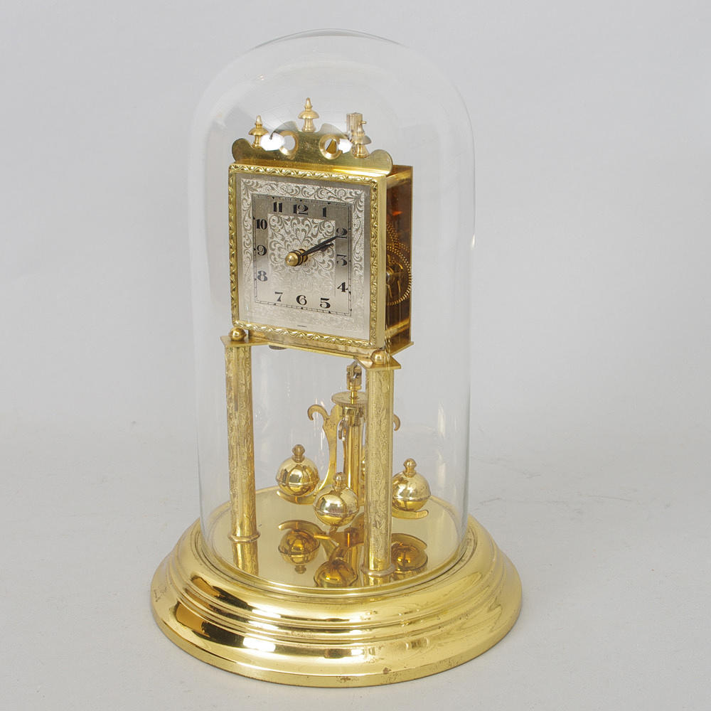 ÅRSUR, Koma, mässing/glas.